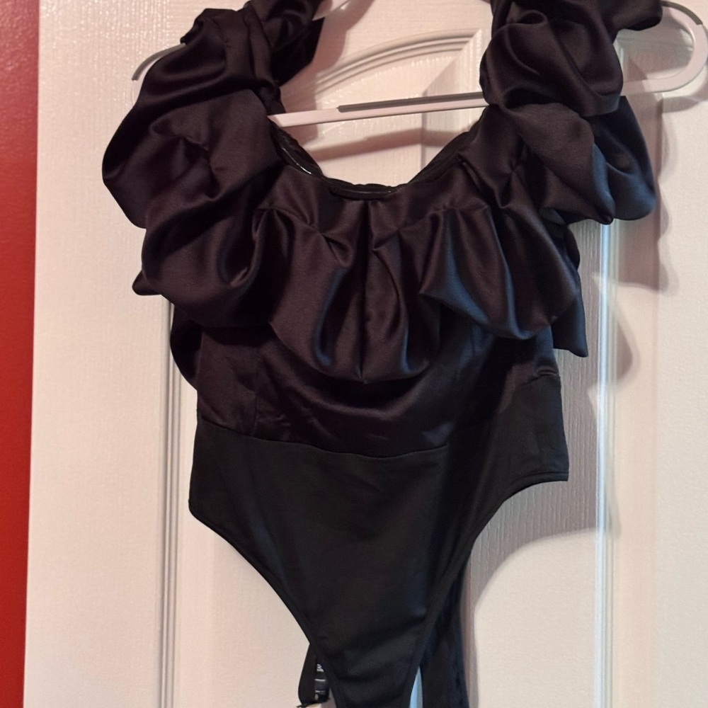 Elegant body suit new with tags size medium